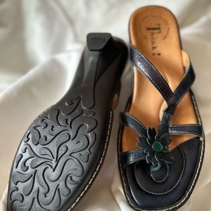 THINK! brand, navy leather sandals like new. Turquoise colored gem accent